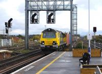 Freightliner 70020 westbound through Didcot on 1 November 2012 with a container train bound for Wentloog.<br><br>[Peter Todd 01/11/2012]