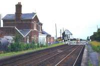 The closed station at Postland, Lincolnshire, on the March - Spalding line in 1977, more than 16 years after closure to passengers. The line itself closed completely in 1982.<br><br>[Ian Dinmore //1977]