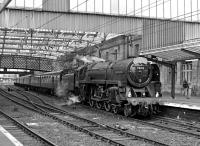 Britannia Pacific No. 70013 <I>Oliver Cromwell</I> comes to a stop at Carlisle's platform 3 on 27 August 2008. The train, which purports to be the down 'Thames-Clyde Express', is actually the terminating 'Dalesman' excursion from Hellifield.<br><br>[Bill Jamieson 27/08/2008]