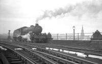 B1 no 61199 photographed from the Gateshead side of the High Level Bridge, thought to be in 1962. The clock tower and spire of Newcastle's All Saints' Church can be seen in the right background on the other side of the Tyne.<br><br>[K A Gray //1962]