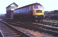 Brush Type 4 Co-Co 1842 stabled by Rose Grove East box on a summer evening in 1970. There were large marshalling yards in front of and behind the box but the staple coal traffic seen here was declining and they closed soon after this picture was taken. Rose Grove East, West and nearby Gannow Jcn boxes were all closed when Preston powerbox opened in 1972. 1842 later became 47192 and is now preserved at Crewe Heritage Centre. [See image 27219] for a view in the opposite direction on the same day. <br><br>[Mark Bartlett //1970]