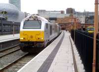 If a run parallel to 'Offa's Dyke' is not on your agenda [see image 39316], try Birmingham Moor Street, where twice a day, you can find a 67 hauling 6 coaches and a DVT. 67015 <I>David J. Lloyd</I> does the honours on 9 November. I have it on good authority that Selfridges (left) does not, in fact, sell fridges.<br><br>[Ken Strachan 09/11/2012]