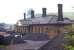 The 1862 station at Bakewell, on the one-time MR main line through the Peak District, had closed to passengers in March 1967 and to freight in July 1968. Four years after complete closure, the station forecourt was suffering the ignominy of use as a coal merchant's yard.<br><br>[Bill Jamieson 21/07/1972]