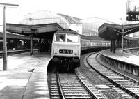 An afternoon semi-fast service to Worcester and Hereford prepares to leave Paddington station in May 1969 behind an unidentified <I>'Hymek'</I> diesel-hydraulic locomotive.<br><br>[John Furnevel 05/05/1969]