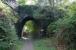 The overbridge just beyond the site of station throat at Coniston in October 2006, nearly half a century after closure.<br><br>[Colin Miller 03/10/2006]