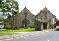 Looking east across the A6136 towards the old terminus at Richmond, North Yorkshire, in June 2011. The restored station (closed in 1969) now houses a cafe, shops, cinema, museum, exhibition centre etc. [See image 34881]<br><br>[John Furnevel 27/06/2011]