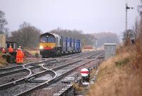 20 November saw the first of three trial runs of containers from Highland Spring, Blackford to Coatbridge FLT operated by John G Russell and DRS. 66427 is seen with the containers in the sidings at Blackford.<br><br>[Bill Roberton 20/11/2012]