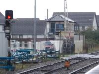 View west from the platform at Llanelli Station in October 2012. Llanelli West Frame box is sited alongside the down line on the west side of the Glanmor Road level crossing. <br><br>[David Pesterfield 31/10/2012]