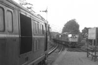 An NBL Type 2 waits at Arrochar and Tarbet with a train for Oban in July 1967, as the Fort William sleeper approaches from the north with through coaches for Kings Cross.<br><br>[Colin Miller /07/1967]