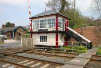 A sunny May morning at Culgaith in 2006. The Midland signal box stands alongside the B6412 level crossing with part of the former station (closed May 1970) in the background and Culgaith Tunnel off picture to the left.<br><br>[John Furnevel 06/05/2006]