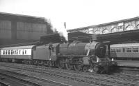 Black 5 no 44948 stands at Carlisle platform 4 on 15 July 1967. The Carnforth based locomotive is about to take forward the 1.26pm Summer Saturday Glasgow Central - Morecambe Promenade, which had arrived via Kilmarnock and Dumfries.<br><br>[K A Gray 15/07/1967]