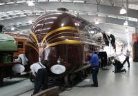 Having been transferred from York the previous week behind Deltic 55002 [See image 41111] 6229 <I>Duchess of Hamilton</I> and its LMS coach are given a thorough clean by a group of <I>Friends</I> at Locomotion, Shildon. The connecting rods, removed for the rail transfer, had not been refitted at this time but the loco still looked magnificent. <br><br>[Mark Bartlett 27/11/2012]