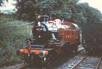 Ivatt 2-6-2T no 41241 in the process of running round its train at Oxenhope on the Worth Valley line in the 1960s.<br><br>[Robin Barbour Collection (Courtesy Bruce McCartney) //]