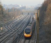 On a cold and frosty St Andrew's Day a Pendolino leaves Preston behind as it heads south past Skew Bridge Junction. The service had left Glasgow Central at 06.30 for Euston.<br><br>[John McIntyre 30/11/2012]