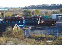 Unrestored but almost complete Collett GWR 6600 class 0-6-2 tank 6686 has recently been moved out of Barry shed into the yard. The locomotive is now stabled at the end of road 6 alongside Black 5 44901 and 9F 92245 on road 7. View from the footbridge at Barry (Town) station on 29 November 2012. <br><br>[David Pesterfield 29/11/2012]