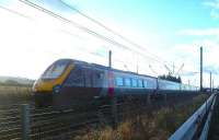 The 13.06 Edinburgh - Plymouth CrossCountry Voyager speeds through the loops east of Drem station on a wintry Wednesday afternoon in December 2012.<br><br>[Bruce McCartney 05/12/2012]