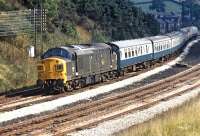 The Harwich to Manchester Piccadilly boat train snakes through the site of Buxworth station, Derbyshire, on 21 September 1971 behind EE Type 3 No. 6712. The duty represented a definite improvement in the loco's fortunes following its transfer from Gateshead to Stratford the previous autumn [see image 32737].<br><br>[Bill Jamieson 21/09/1971]