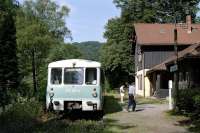 Power car No. 772015 (with trailer car No. 972615 in front) has halted at Porschdorf, on the so-called Saxon Semmering line between Sebnitz and Bad Schandau on 26 June 2001 with the 08.30 departure from Neustadt (Sachsen). The schedule was obviously very leisurely as the crew showed us inside one of the station buildings where there was some sort of exhibition, probably celebrating the centenary of the line, which had opened in 1898.  [See image 40760]<br><br>[Bill Jamieson 26/06/2001]