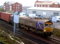 Selective cleaning? Most of GB Railfreight's 66.727 was filthy as it headed towards Birmingham with a container train on 8th December, but the numerals 727 seem to have been attacked with a mop. Very kind of someone...<br>Network Rail - reinstated Leicester-Birmingham flyover line <br><br>[Ken Strachan 08/12/2012]