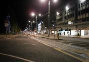 Looking west along Princes Street past The Mound tram stop on 10 December 2012.  Catenary supports can be seen attached to the poles.  No sign of an illuminated tram in the Blackpool manner!<br><br>[Bill Roberton 10/12/2012]