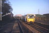 143612 westbound for Carlisle, photographed at Brampton, Cumbria, in May 1990. The platform for the short branch to Brampton Town (closed 1923) was just off picture to the left. <br><br>[Ian Dinmore /05/1990]