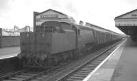 Bulleid 'Battle of Britain' Pacific no 34054 <I>Lord Beaverbrook</I> at Salisbury on 24 September 1963 with the empty stock of the 6.55am ex-Yeovil Town.<br><br>[K A Gray 24/09/1963]