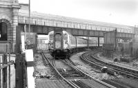 4 CEP (Class 411) unit 1560 emerges from Dover Western Docks on 13 February 1993 bound for London Victoria. The station at Western Docks (formerly Dover Marine) closed the following year. The listed station building was subsequently put to use as a cruise terminal.<br><br>[Bill Roberton 13/02/1993]