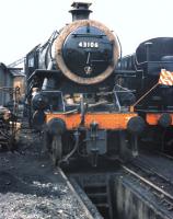 Ivatt class 4 2-6-0 no 43106 receiving some serious attention at Bridgnorth in 1974.<br><br>[Colin Miller //1974]
