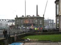 The 1842 station building at Haymarket on 12 December 2012, with tramworks in the foreground and station/interchange extension work in progress beyond.<br><br>[John Furnevel /12/2012]