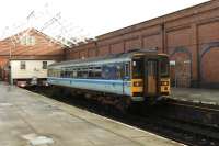 Regional Railways liveried 153354 lays over at Llandudno prior to departure for Blaenau Ffestiniog on 31 October 1992.<br><br>[David Pesterfield 31/10/1992]