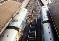 View west from Waverley Bridge in April 1975, showing a pair of Edinburgh - Glasgow push-pull services, complete with class 27 locomotives at each end.<br><br>[John Furnevel 16/04/1975]