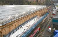 View east from Edinburgh's North Bridge towards the Calton Tunnel on a dismal 12 December 2012, with work on the new canopy over the 'sub' platforms well advanced. A Virgin Voyager is at platform 8. For the previous version of the canopy [see image 7446].<br><br>[John Furnevel 12/12/2012]