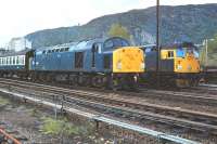 40046 leaves Aviemore for Inverness on 9 June 1979, passing 26036 in the loop just to the north of the station.<br><br>[Peter Todd 09/06/1979]