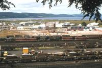Millburn Yard plays host to hoppers, oil tanks, pipe wagons, demountable whisky tanks and ballast wagons in 1981.<br><br>[Frank Spaven Collection (Courtesy David Spaven) //1981]