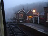 Levisham Station Signal Box and Ticket Office seen at dusk on Sunday 16 December 2012. The steam from 45428 <I>Eric Treacy</I> adds to the haze by the signal box. <br><br>[David Pesterfield 16/12/2012]