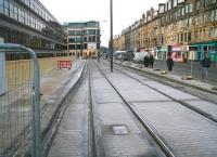 <I>'The next tram is due in the summer of 2014.'</I> The tram stop at Haymarket on 12 December 2012. View west along Haymarket Terrace.<br><br>[John Furnevel /12/2012]
