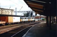 86618+86638 double head a southbound Intermodal working through Carlisle Station in August 1992.<br><br>[David Pesterfield 24/08/1992]