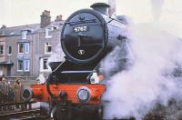 Preserved Stanier Black 5 no 4767 stands at Seascale station on the Cumbrian Coast with a 'Santa Special' on 27 December 1980. The train, which had originated from Hull, had been organised by the Hull Locomotive Preservation Group. [With thanks to Messrs Smith, Parry and Palmer]<br><br>[Peter Todd 27/12/1980]