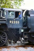 Cabside view of BR Standard class 9F 2-10-0 no 92203 at Cranmore on the East Somerset Railway on 17 June 1985.<br><br>[Peter Todd 17/06/1985]