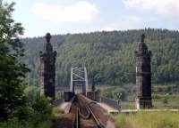 The view ahead from the 08.30 Neustadt (Sachsen) to Bad Schandau train which is about to step onto the bridge over the River Elbe shortly before reaching its destination in June 2001. The Prague to Dresden main line can be discerned just below the trees on the far side.<br><br>[Bill Jamieson 26/06/2001]