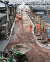 No entry. Resurfacing work in progress on the north ramp at Waverley on 12 December 2012. View west from the cross-station walkway towards Waverley Bridge.<br><br>[John Furnevel 12/12/2012]