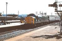 40081 arrives out of the sun at Aberdeen on 5 May 1980 with a train from the south.<br><br>[Peter Todd 05/05/1980]