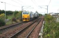 A Network Rail RHTT unit heading south west on the Caledonian route out of Edinburgh in October 2007, shortly after passing through Wester Hailes station.<br><br>[John Furnevel 04/10/2007]