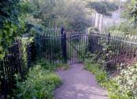 This 'kissing gate' adjacent to platform 1 at Castle Cary is a nice period touch. View North in July 2012.<br><br>[Ken Strachan 28/07/2012]