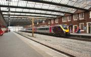 A <I>CrossCountry</I> Voyager on a Manchester to Bournemouth service calls at Stoke-on-Trent on 21 March 2012. The train is at its 3rd stop 39 minutes into the 4 hours and 45 minute journey with another 14 to go before reaching its destination.<br><br>[John McIntyre 21/03/2012]