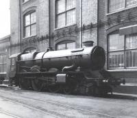 A tenderless 'King' Class 4-6-0 no 6018 <I>King Henry VI</I> stands outside Swindon Works in June 1963 awaiting attention.<br><br>[David Pesterfield 09/06/1963]