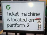 Equal access for all - even Imperial Stormtroopers carrying pink umbrellas and wearing piebald wellies can buy tickets at Atherstone station.<br><br>[Ken Strachan 21/12/2012]