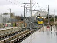 Thorpes Bridge Junction was the point where two lines from Manchester Victoria (via Miles Platting and Cheetham Hill) met and also where the Rochdale and Oldham lines divided. Oldham Metrolink trams use the Cheetham Hill trackbed from Smedley Viaduct Jcn but at Thorpes Bridge Jcn a new bridge carries them over the Manchester Rochdale railway lines. 3013 negotiates the bridge approach as it descends towards the new tram station known as Central Park. Newton Heath TMD is on the other side of the bridge. <br><br>[Mark Bartlett 28/12/2012]