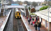 A Dunblane - Edinburgh 158 arrives at Falkirk Grahamston on 2 January 2013, a day of reduced train services. The station car park also bears testament to the fact that today is a holiday in Scotland.<br><br>[John Furnevel 02/01/2013]