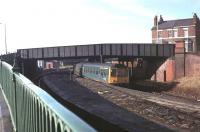 A Southport to Manchester Victoria BRCW DMU passing through the closed station of St Lukes shortly after commencing its journey in 1980. The station closed to passengers in September 1968. [With thanks to Charles Boylan and Jim Byers]<br><br>[Mark Bartlett //1980]